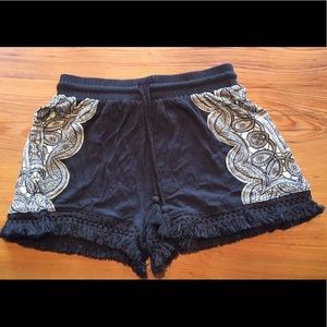 drawstring flowy shorts with fringe detail